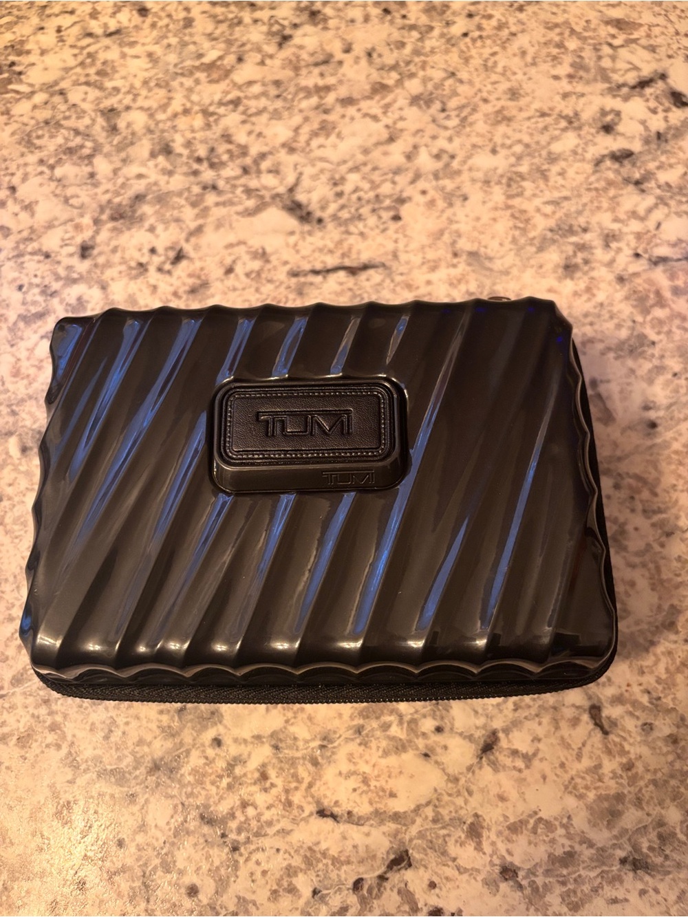 Tumi Black Ribbed Hard Travel Case
